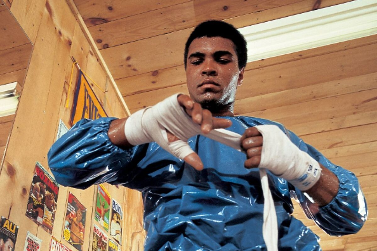 A &apos;high or drunk&apos; Elvis Presley was 12 hours late to sparring session with Muhammad Ali, per biographer