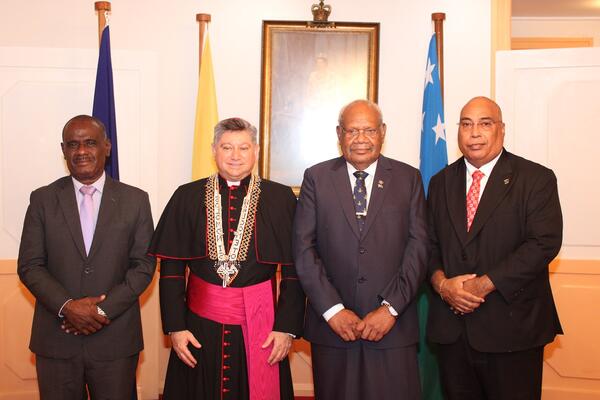 Minister of Foreign Affairs and External Trade, Hon. Jeremiah Manele, Apostolic Nuncio of the Holy See to the Solomon Islands, H.E Fremin Emilio Sosa Rodriguez, Acting Governor General, Hon. Patterson Oti and Permanent Secretary of MFAET, Colin Beck.