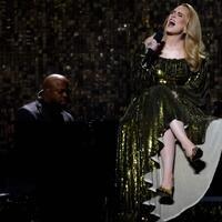 Don't throw stuff at us, Adele urges fans