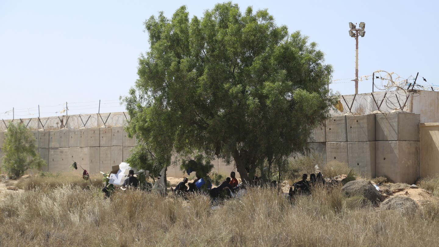 At least 27 migrants found dead in the desert near Tunisian border, Libyan government says