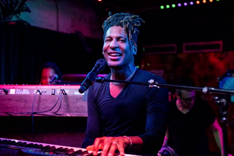 FILE - Jon Batiste performs at the Maple Leaf Bar in New Orleans in May 2. The singer-songwriter and multi-instrumentalist new album 'World Music Radio.' (Photo by Amy Harris/Invision/AP, File)
