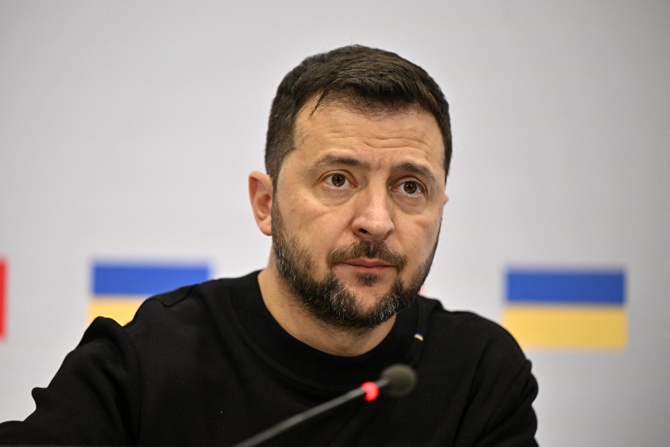 Volodymyr Zelensky attends a Brussels press conference