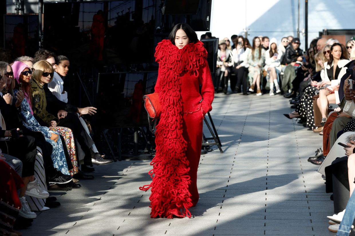 Beatles-filled Paris runway highlights fashion's sustainability problem