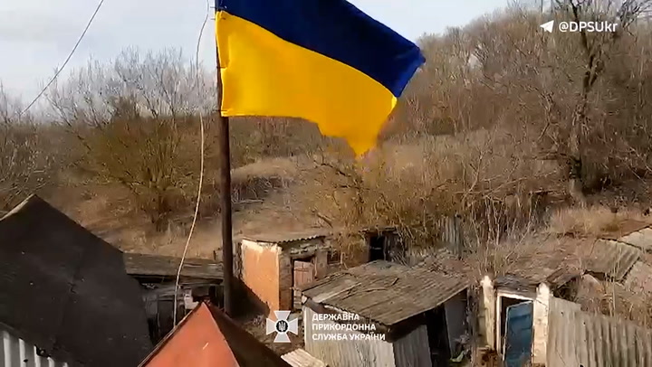 Ukrainian flag raised by soldiers after