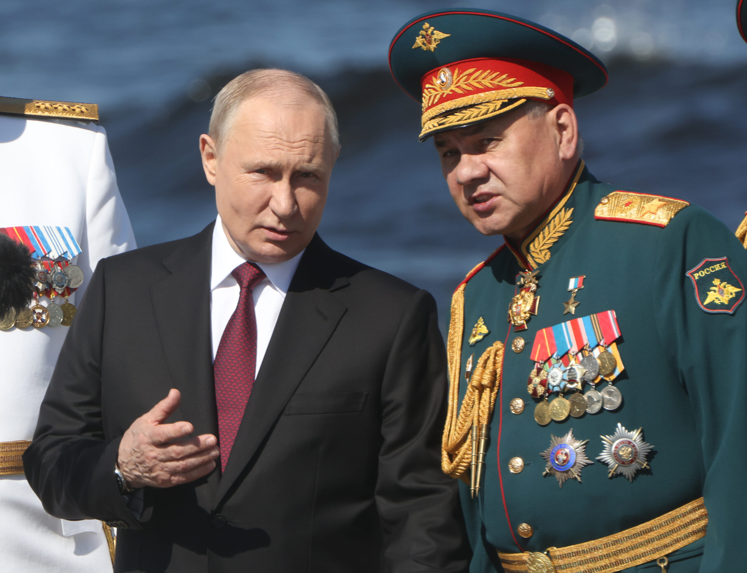 Vladimir Putin seen with Sergei Shoigu